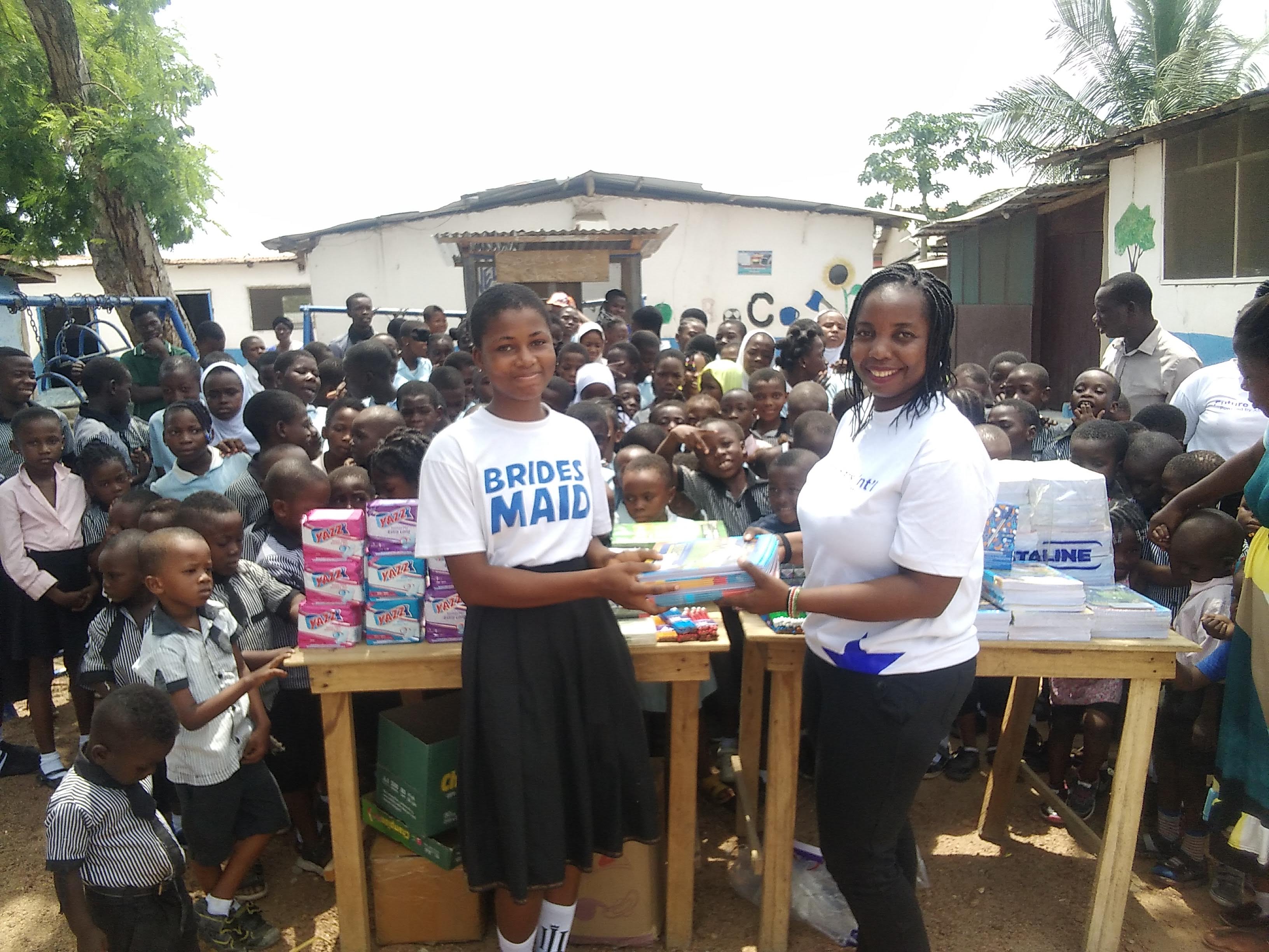 Girl receiving sanitary pads